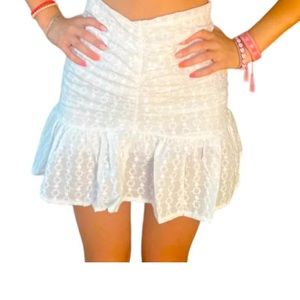 White high rise skirt. Embroidered throughout. Size Small NWT